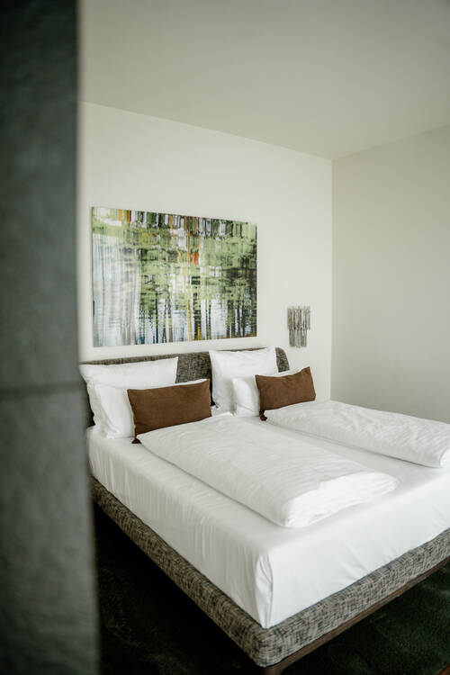 Bett im Schlafzimmer der Suite.